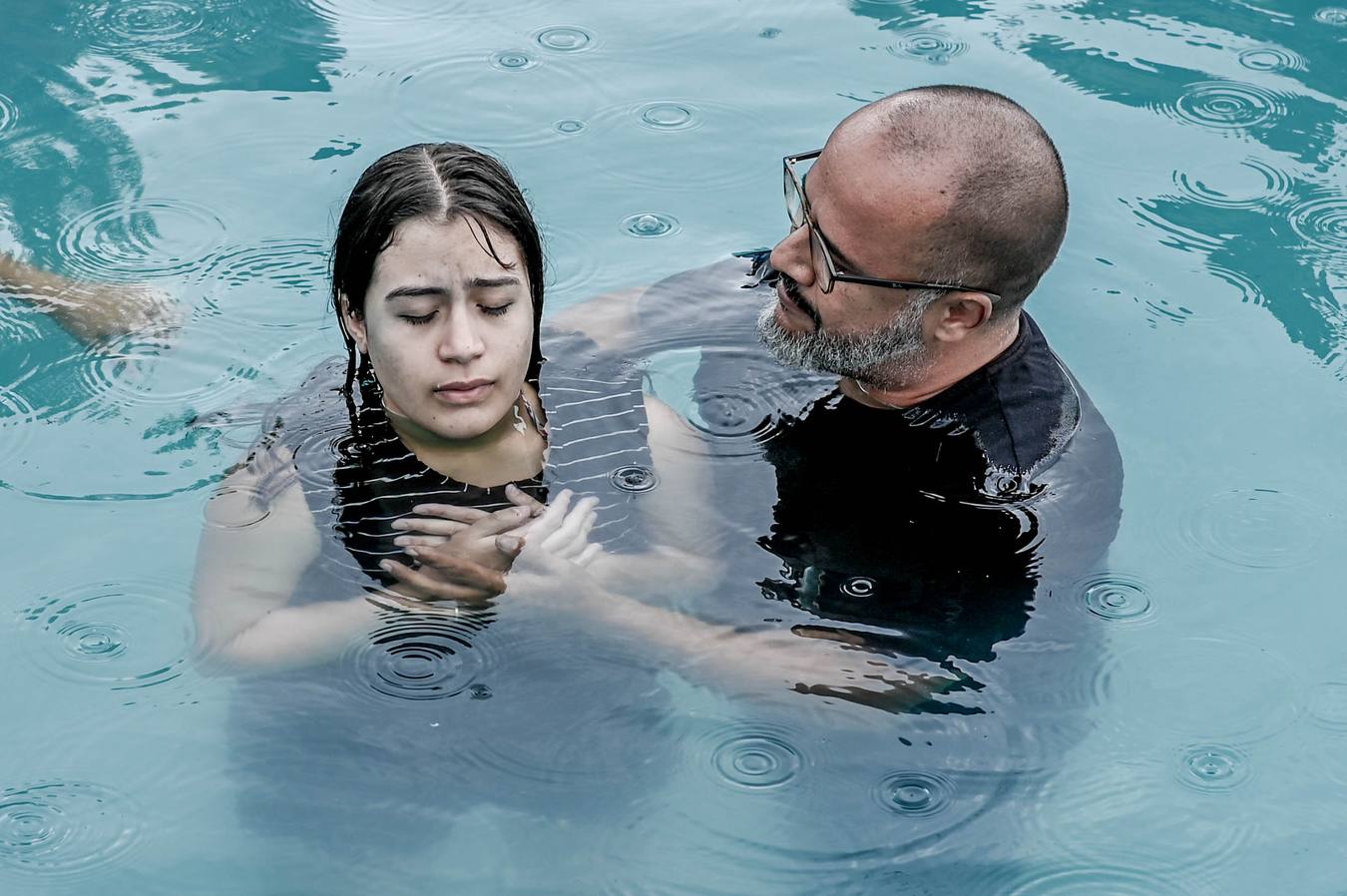 Momento de oração antes do batismo